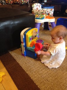 Chyler playing with her new kitchen.....she loves this thing!